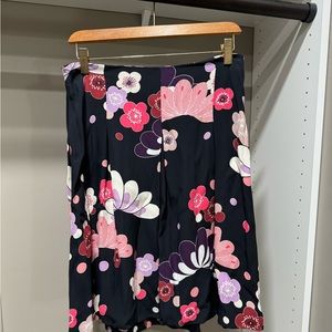 Beautiful floral skirt on black background. Great for work or date night